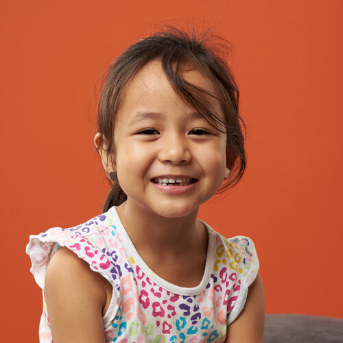 Little Girl smiling after dental crowns